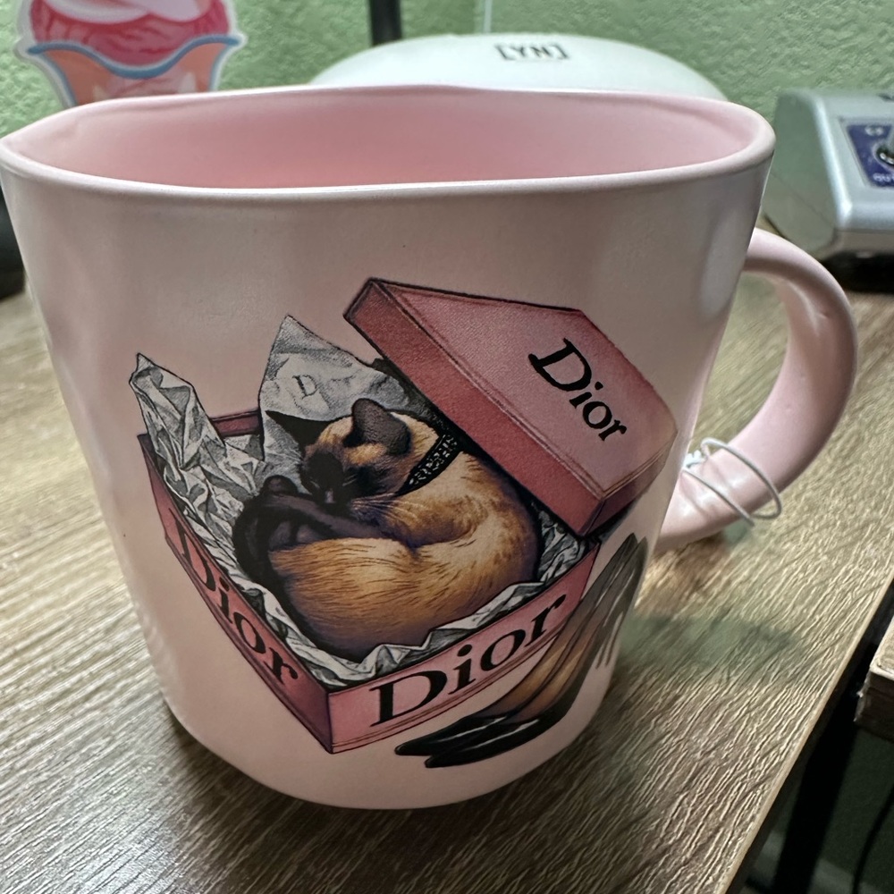 Handcrafted Mug featuring Dior by Amanda Greenwood Art